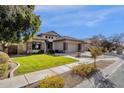 Single-story home with landscaped yard and three-car garage at 7893 S Stephanie Ln, Tempe, AZ 85284