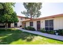 Building exterior with walkway, landscaping and tree at 8241 N Central Ave # 13, Phoenix, AZ 85020