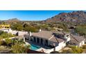 Luxury home with pool and spa, scenic mountain backdrop at 10452 E Quartz Rock Rd, Scottsdale, AZ 85255