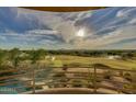 Stunning view of a golf course from a private balcony at 12308 N 119Th St, Scottsdale, AZ 85259