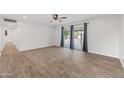 Living room with sliding glass doors to backyard at 1312 E Colter St, Phoenix, AZ 85014