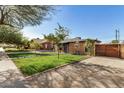 House exterior showcasing a brick facade and street view at 2218 N 8Th St, Phoenix, AZ 85006