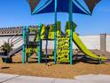 Modern playground equipment under a shaded play structure at 4296 W Jeanette Ln, San Tan Valley, AZ 85144