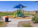 Playground with shade structure and nearby benches at 4406 W Josephine St, San Tan Valley, AZ 85144