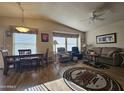 Bright living room featuring hardwood floors and comfortable seating at 650 N Hawes Rd # 4430, Mesa, AZ 85207