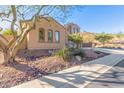 Two-story house with a large tree and desert landscaping at 6857 W Juana Dr, Peoria, AZ 85383