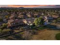 Aerial view of house and neighborhood, showcasing the surrounding community at 9758 E Meseto Ave, Mesa, AZ 85209