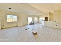 Spacious living room with tile flooring and open floor plan at 13586 S Kashmir Rd, Arizona City, AZ 85123