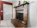 Cozy brick fireplace in living room at 261 W 21St Ave, Apache Junction, AZ 85120