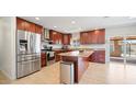 Modern kitchen with stainless steel appliances and island at 3737 W Morrow Dr, Glendale, AZ 85308