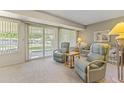 Relaxing Gathering room with sliding door to backyard access at 13416 N Cedar Dr, Sun City, AZ 85351