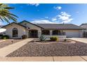 Single-story home with landscaped front yard and driveway at 13907 W Terra Vista Dr, Sun City West, AZ 85375