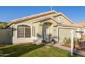 One-story house with a two-car garage and well-maintained landscaping at 1434 E Detroit St, Chandler, AZ 85225