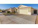 Front view of a house with a driveway and walkway at 1434 E Detroit St, Chandler, AZ 85225