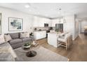 Living room and kitchen with an open floor plan at 20739 N 223Rd Ave, Surprise, AZ 85387