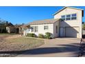 Charming single-story home with a well-maintained lawn and driveway at 2232 N 13Th St, Phoenix, AZ 85006