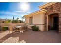 Covered patio with seating area, perfect for outdoor dining at 22808 N Los Gatos Dr, Sun City West, AZ 85375