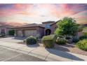 Lovely three-car garage home with desert landscaping, inviting curb appeal at 3817 E Cielo Grande Ave, Phoenix, AZ 85050