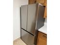 Stainless steel refrigerator in a modern kitchen setting at 3941 E Emile Zola Ave, Phoenix, AZ 85032