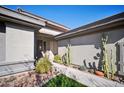 Front entry has a walkway and drought-tolerant landscaping at 42028 N Crooked Stick Rd, Anthem, AZ 85086