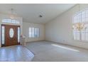 Bright and spacious living room with vaulted ceilings and lots of natural light at 5335 W Bloomfield Rd, Glendale, AZ 85304