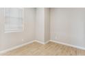 Empty bedroom with tile flooring and window blinds at 5846 E Ringtail Way, Phoenix, AZ 85054