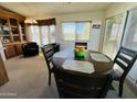 Bright dining area with a round table and four chairs, built in hutch at 8700 E University Dr # 633, Mesa, AZ 85207