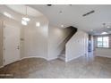 Bright and airy entryway with tile floors and curved wall at 10332 W Devonshire Ave, Phoenix, AZ 85037