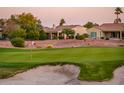 View of a golf course with a sand trap and green at 12928 W Santa Ynez Dr, Sun City West, AZ 85375