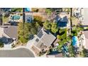 Aerial view showcasing a house with pool, backyard, and surrounding homes at 2874 E Westchester Dr, Chandler, AZ 85249