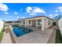 Inviting rectangular pool with a large patio area at 319 S 227Th Ct, Buckeye, AZ 85326