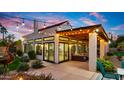 Relaxing covered patio with comfortable seating and string lights at 5012 E Blanche Dr, Scottsdale, AZ 85254