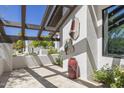 Outdoor patio area with pergola and modern decor at 6184 N 28Th Pl, Phoenix, AZ 85016