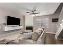 Cozy living room featuring a fireplace and comfortable seating at 921 W University Dr # 1136, Mesa, AZ 85201