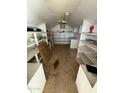 Organized storage interior with shelves and flooring at 9501 E Broadway Rd # 107, Mesa, AZ 85208
