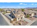 Two-story house with solar panels and a large backyard at 11506 E Sylvan Ave, Mesa, AZ 85212