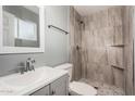 Clean bathroom with a large shower and modern vanity at 132 W Beautiful Ln, Phoenix, AZ 85041