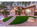 Two-story house with a brick walkway and green lawn at 15237 S 19Th Way, Phoenix, AZ 85048