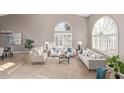 Bright and airy living room with vaulted ceiling, large windows, and stylish contemporary decor at 15237 S 19Th Way, Phoenix, AZ 85048