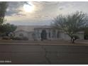 House exterior showcasing Spanish-style architecture and landscaping at 15869 E Ponderosa Dr, Fountain Hills, AZ 85268