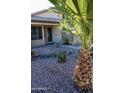 Front entrance with security door and stone pathway at 22233 N 76Th Dr, Peoria, AZ 85383