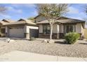 Charming one-story home with stone accents and drought-tolerant landscaping at 29875 N Sedona Pl, San Tan Valley, AZ 85143