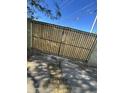 Wooden gate with black metal frame at 4032 N 11Th Ave, Phoenix, AZ 85013