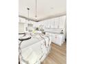 Modern kitchen with marble countertops and white cabinets at 4032 N 11Th Ave, Phoenix, AZ 85013