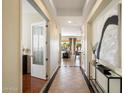 Bright entryway with tile flooring and view into living area at 4655 E Indigo St, Gilbert, AZ 85298