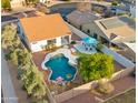 Aerial view showing home with pool and backyard at 6268 S Martingale Ct, Gilbert, AZ 85298