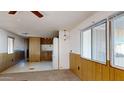 Kitchen area with wood cabinets and white appliances at 8627 E Dulciana Ave # 43, Mesa, AZ 85208