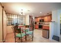 Kitchen with stainless steel appliances and breakfast nook at 10410 N Cave Creek Rd # 1007, Phoenix, AZ 85020