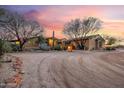 Tuscan-style home on a large lot with scenic views at 14705 E Redbird Rd, Scottsdale, AZ 85262