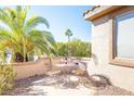 Small patio with table and chairs, perfect for relaxing at 15910 W Autumn Sage Dr, Surprise, AZ 85374